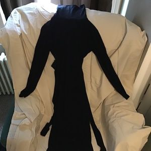 Black past the knee turtle neck dress